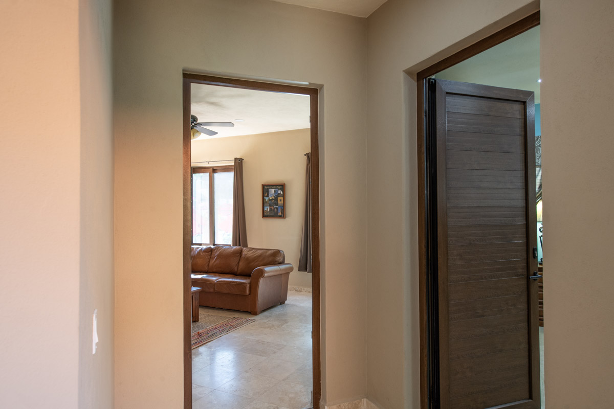 Gorgeous Custom Four Bed/Three Bath Home: hallway to den and primary bedroom