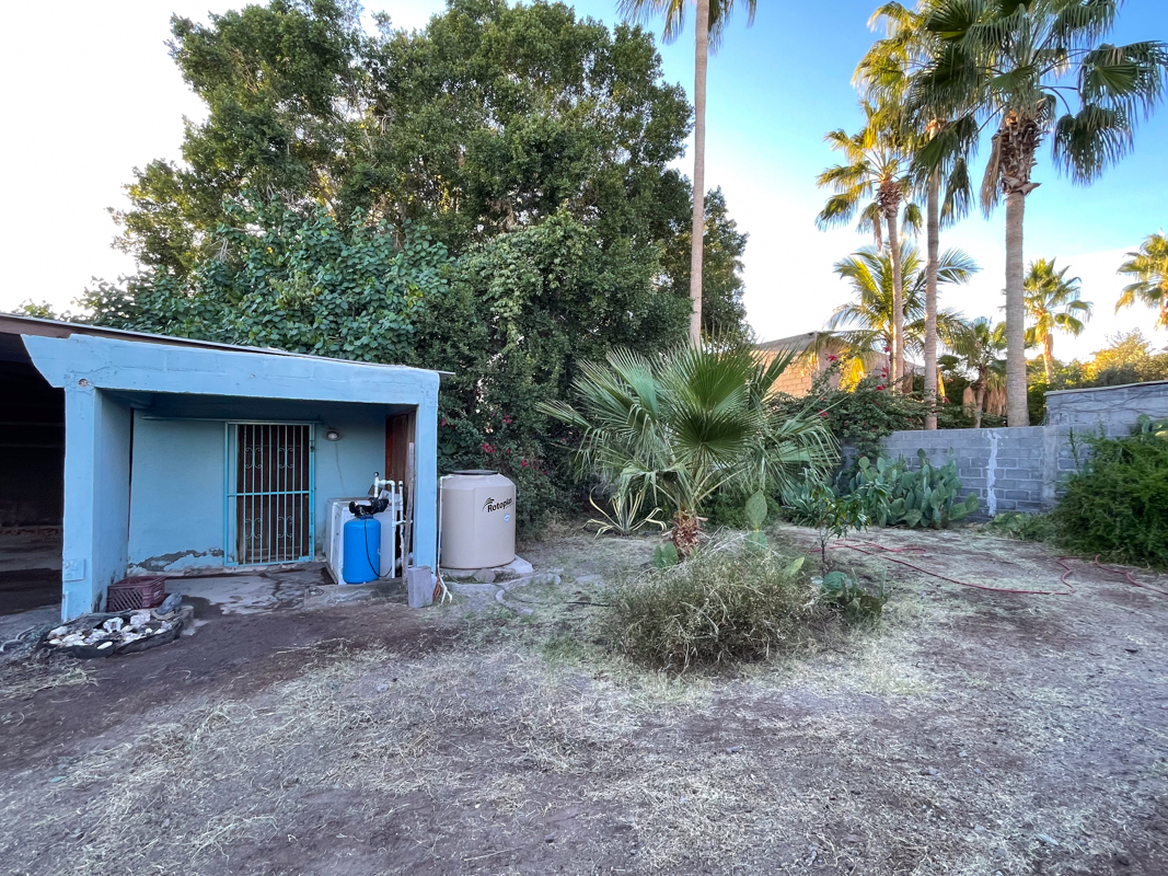 Large residential lot one block from the beach with a studio: Bodega and looking at rear NW corner