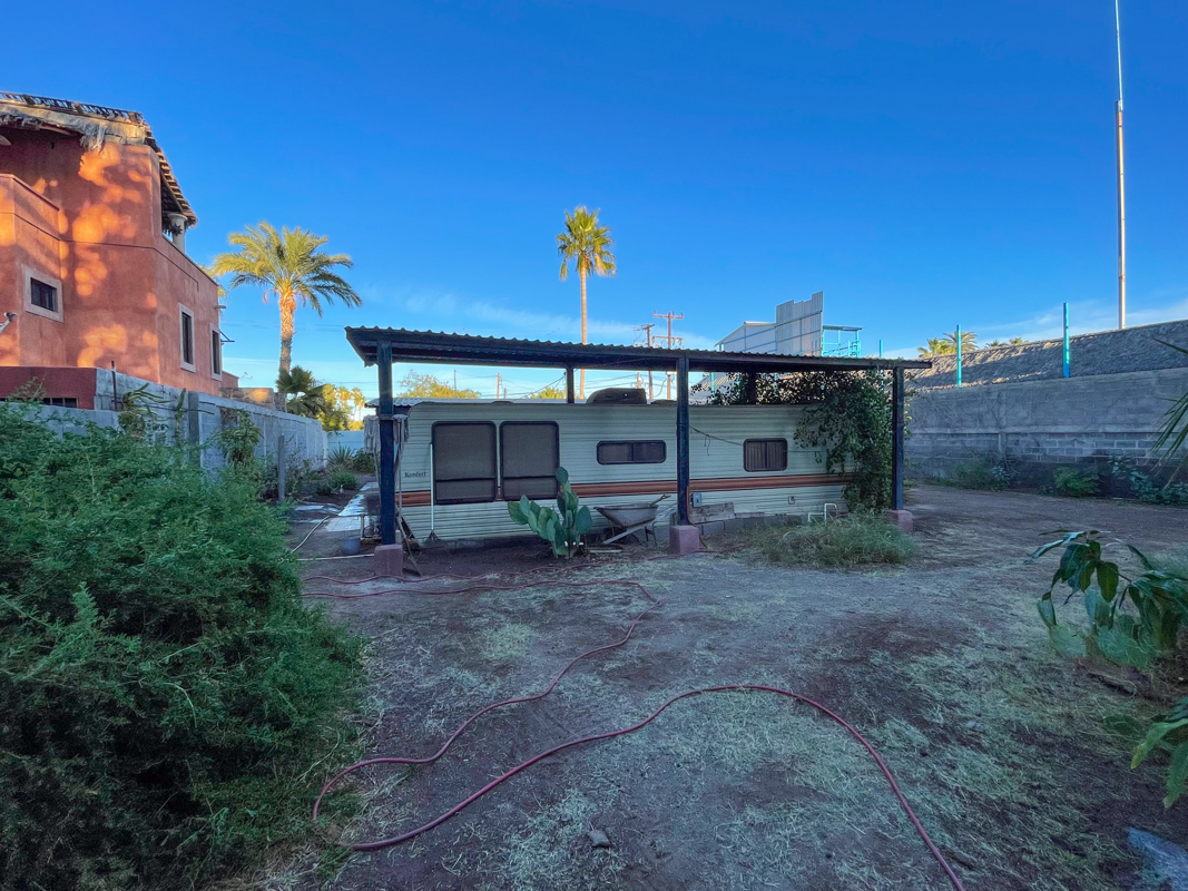 Large residential lot one block from the beach with a studio: